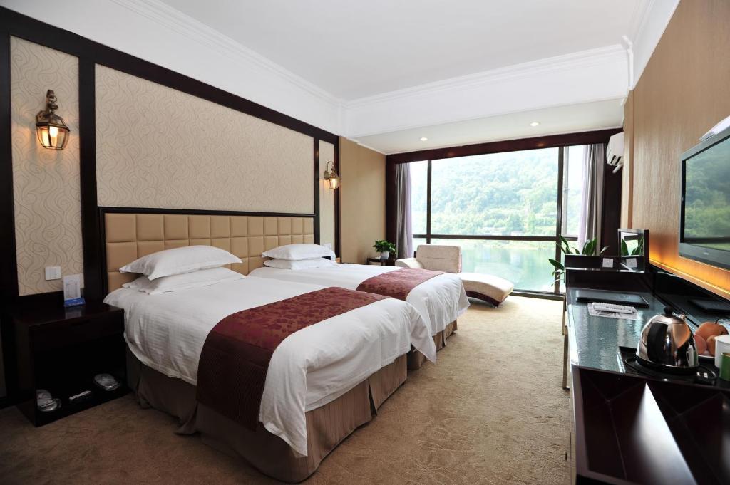 Jiande Yinyuan Hotel Tangcun Стая снимка